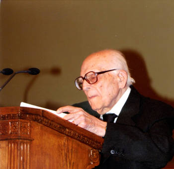 A photo of Emmanouel Kriaras giving a speech